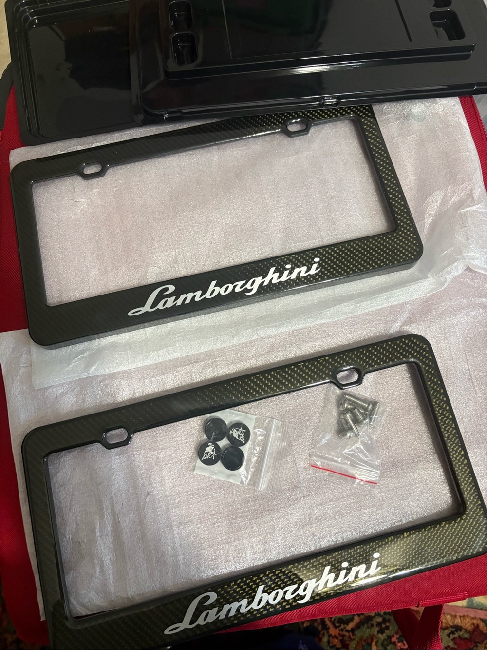 Lamborghini Black Carbon-Finish License Plate Frame with White Script authentic